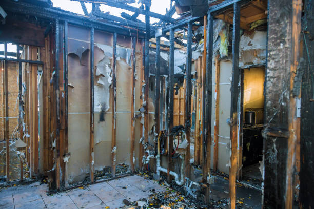 Professional Fire Damage Restoration technician working in Los Alamos, NM